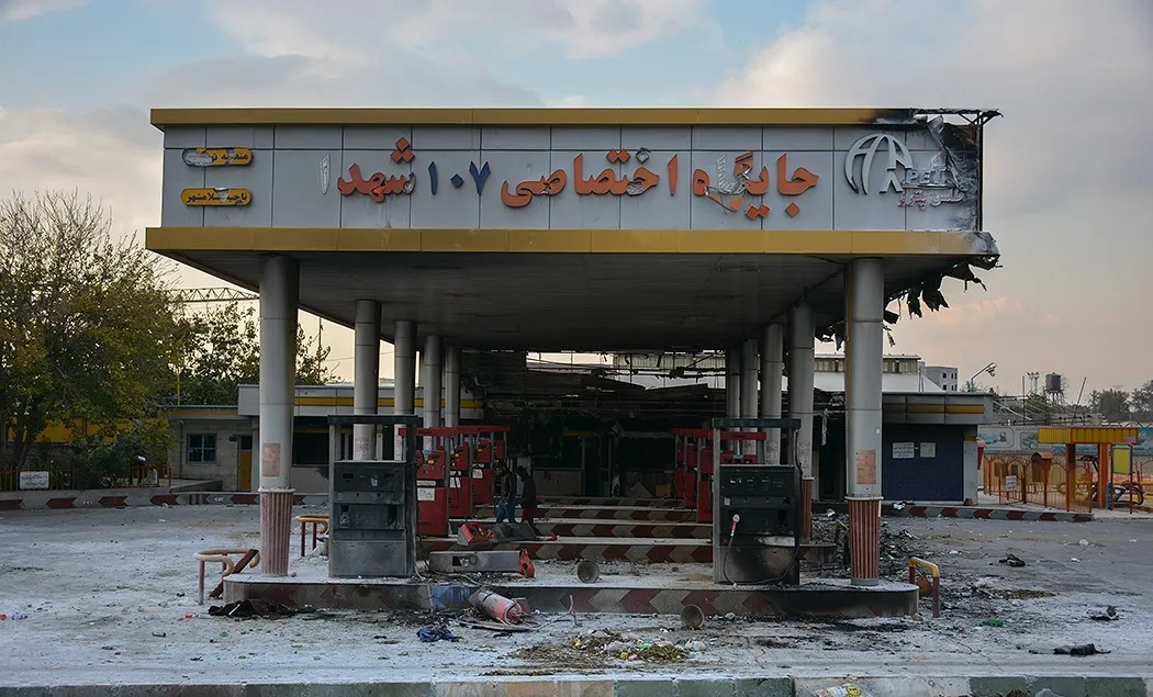 An image of a burnt gas station from the 2019 protests against price increases on fuel (Fars Media Corporation)